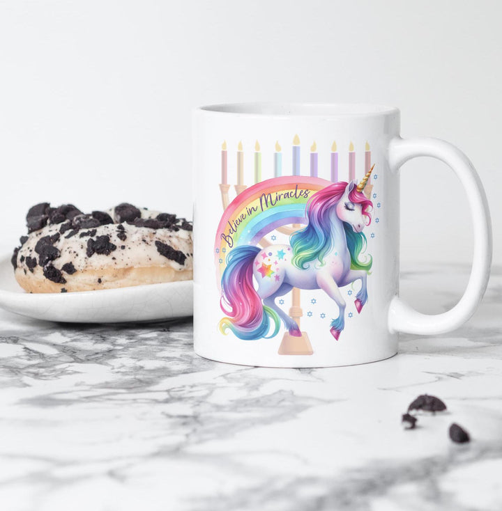 Believe in Miracles Chanukah Ceramic Coffee Mug, Rainbow Unicorn Menorah Coffee Cup for Hanukkah, Jewish Humor Gift, Jewish Home Decor Salt and Sparkle