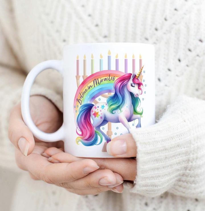 Believe in Miracles Chanukah Ceramic Coffee Mug, Rainbow Unicorn Menorah Coffee Cup for Hanukkah, Jewish Humor Gift, Jewish Home Decor Salt and Sparkle